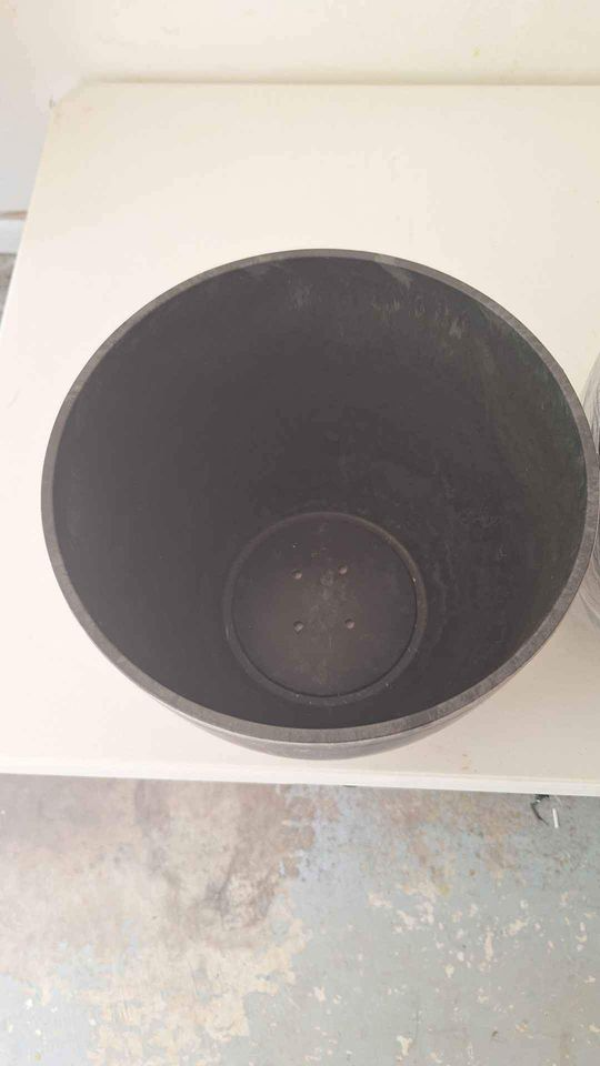 2 brand new black thick plastic vases