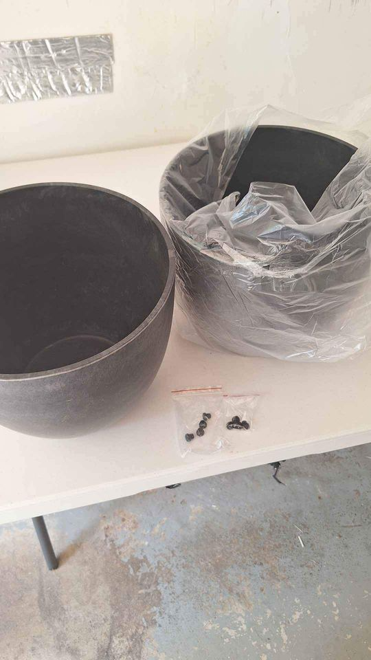 2 brand new black thick plastic vases